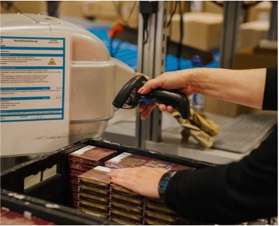 Employee working with WM GROUP's WMS