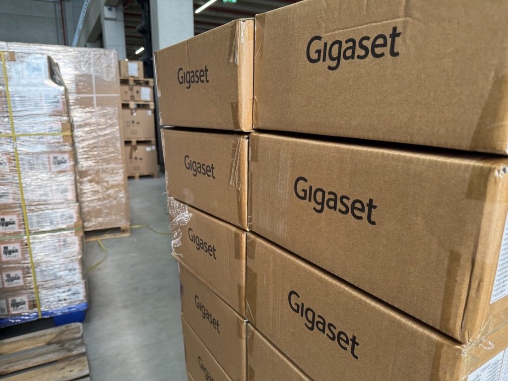Palletised customer shipping cartons in the staging area